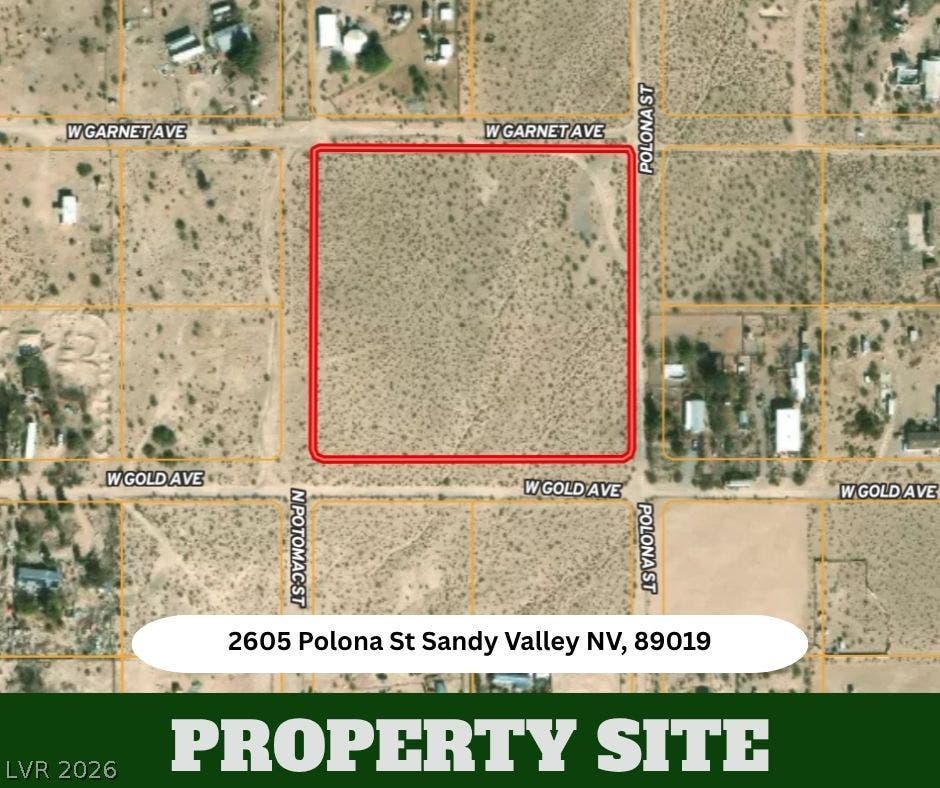 An aerial plat map outlines the boundaries of this desert property site.