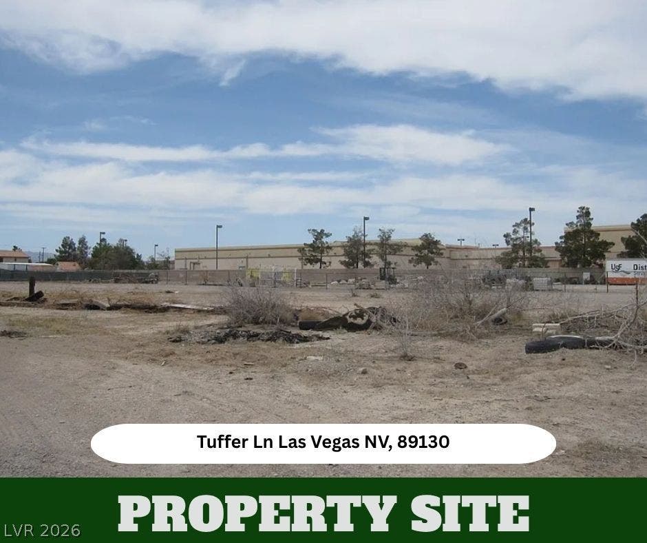 A spacious unimproved lot awaits future development under wide open desert skies.