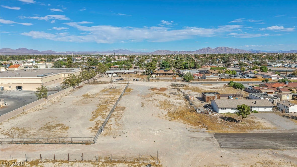 Distant mountains frame this expansive parcel of land offering immense development potential.
