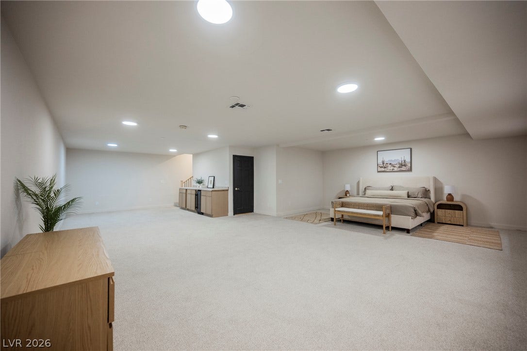 5741 S Pearl Street, Las Vegas, NV 89120 Plush carpeting underfoot and modern recessed lighting create a comfortable atmosphere in this basement suite.