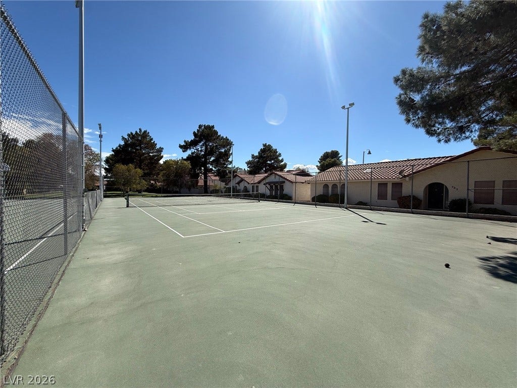 817 Spyglass Lane, Las Vegas, NV 89107 A well-maintained community tennis court near adjacent residences.