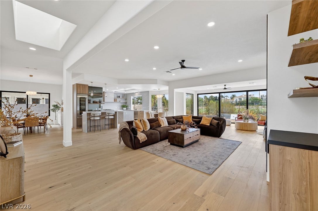 1900 Glenview Drive, Las Vegas, NV 89134 An open floorplan seamlessly connects the airy living space to the adjacent kitchen and dining areas.