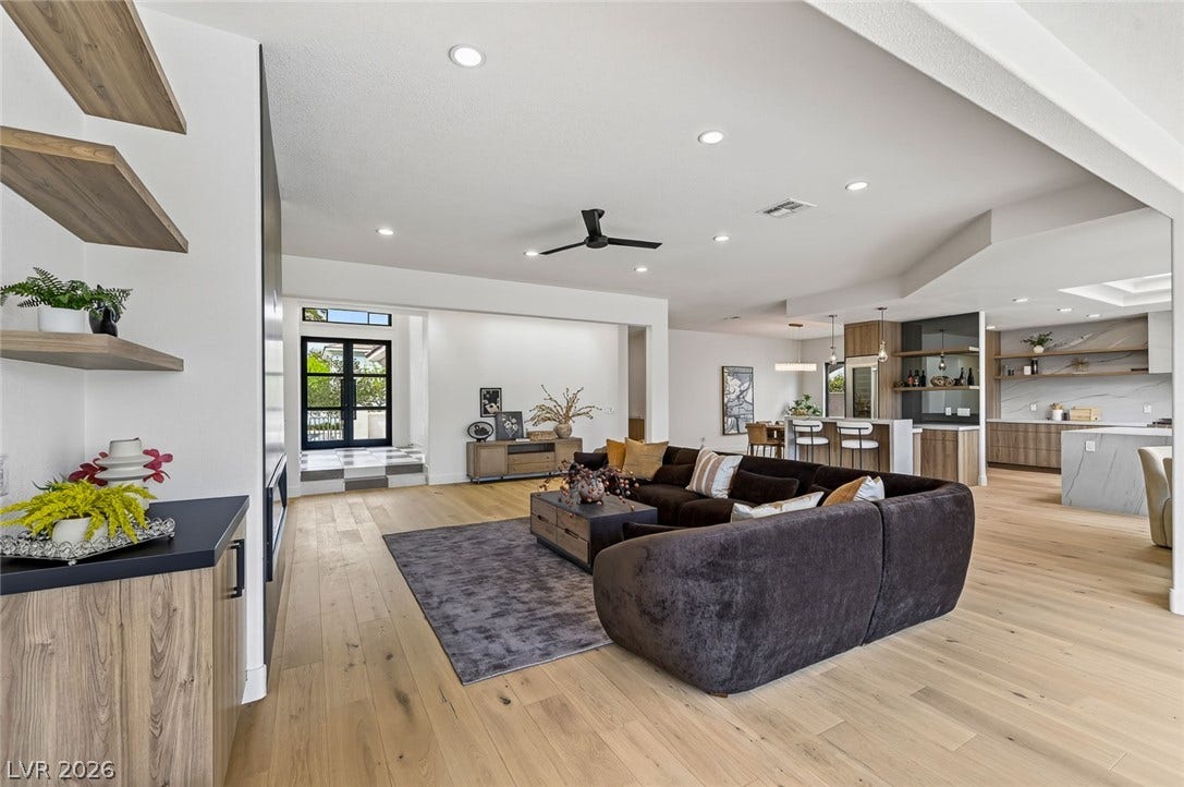 1900 Glenview Drive, Las Vegas, NV 89134 Hardwood floors and recessed lighting anchor this open-concept layout.