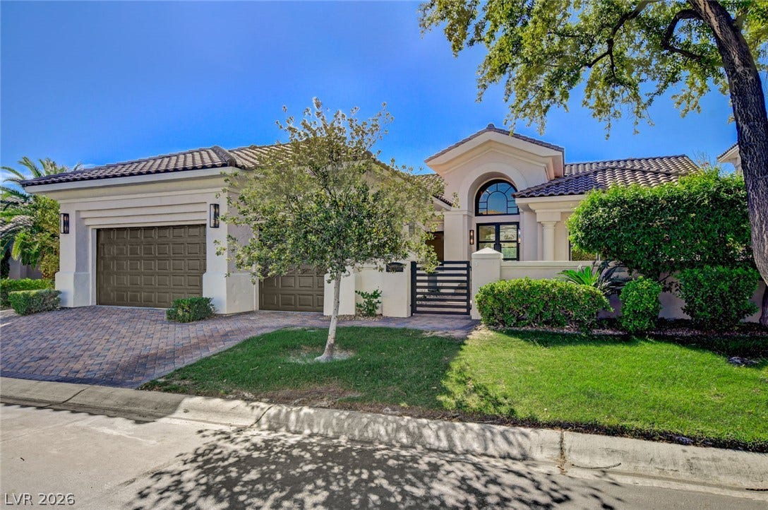 1900 Glenview Drive, Las Vegas, NV 89134 Stately stucco architectural design highlights this elegant single-level home with tile roofing.