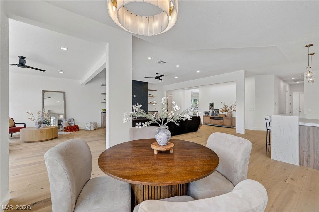 1900 Glenview Drive, Las Vegas, NV 89134 Gleaming hardwood floors and a modern open floorplan connect the airy living areas.