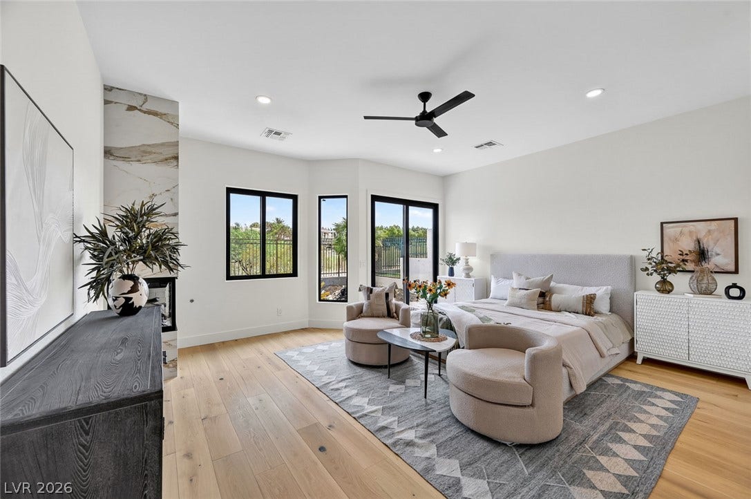 1900 Glenview Drive, Las Vegas, NV 89134 Rich hardwood flooring pairs beautifully with clean plaster walls under a smooth, recessed-lit ceiling.