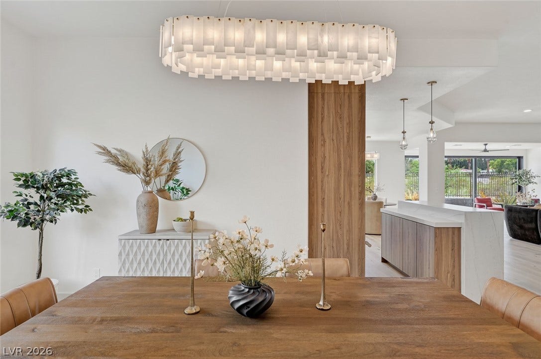 1900 Glenview Drive, Las Vegas, NV 89134 Gleaming wood floors pair beautifully with an airy open layout flowing into the kitchen.