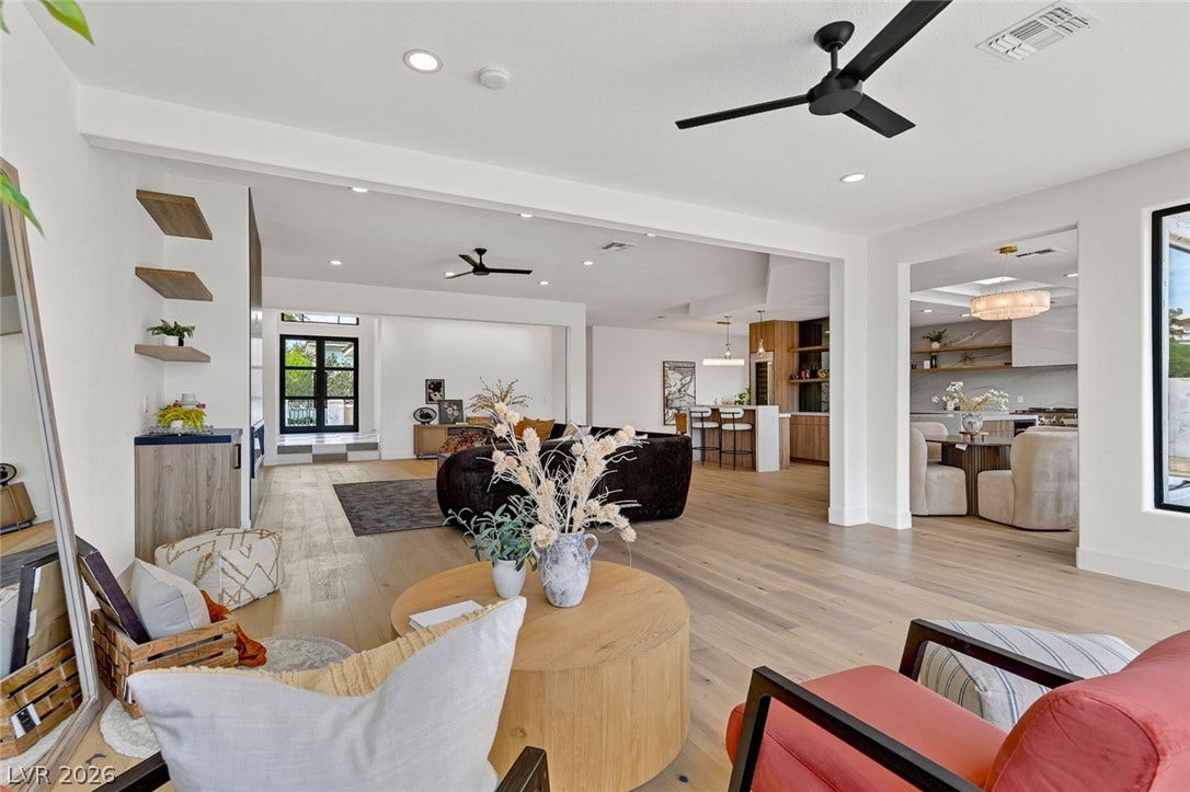 1900 Glenview Drive, Las Vegas, NV 89134 An open floorplan design seamlessly connects the spacious living spaces over handsome wood floors.