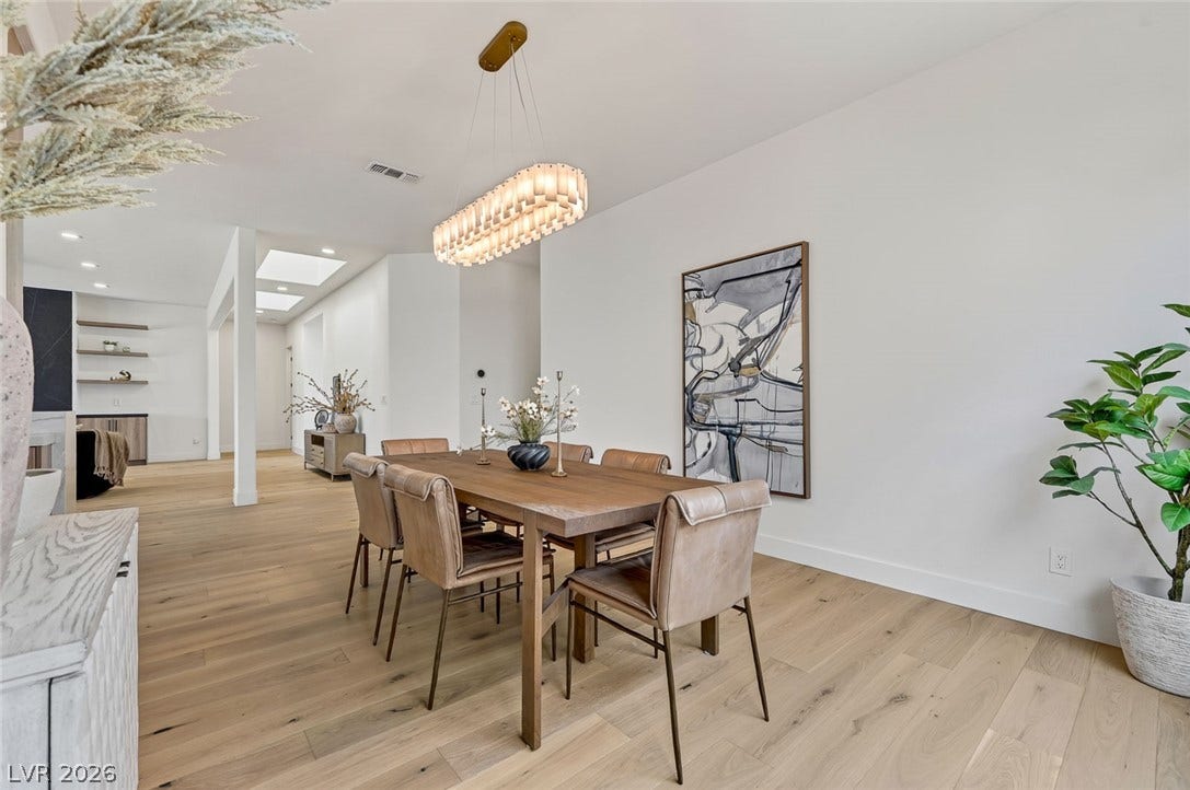 1900 Glenview Drive, Las Vegas, NV 89134 Sleek hardwood floors and high ceilings establish an airy atmosphere in this refined dining area.