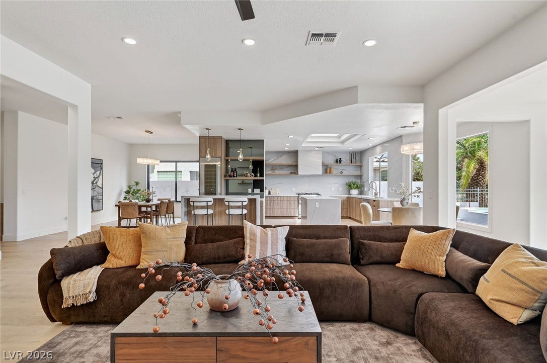 1900 Glenview Drive, Las Vegas, NV 89134 An open floor plan seamlessly connects the main living spaces with wide-plank wood flooring throughout.
