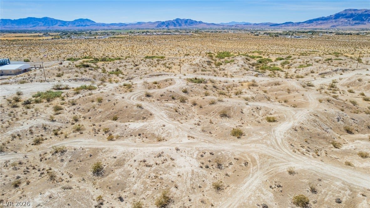 1621 Rockafeller Drive, Pahrump, NV 89060 Rugged desert terrain offers sweeping mountain vistas under vast open skies.