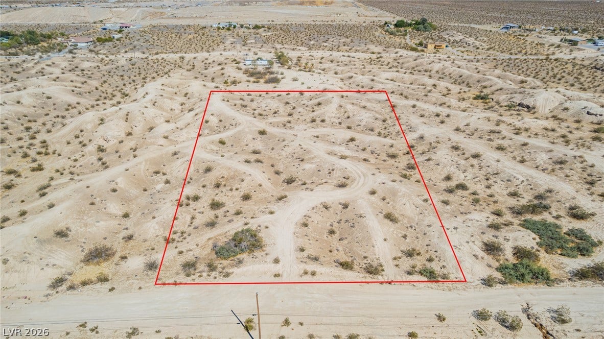 1621 Rockafeller Drive, Pahrump, NV 89060 A vast desert property outline showcases sweeping views of the surrounding natural landscape.
