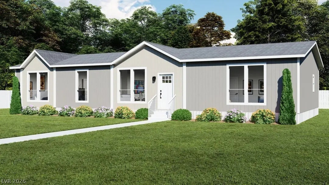 466 Box Canyon Road, Alamo, NV 89001 Crisp white trim highlights the modern siding and clean roofline of this single-level home.