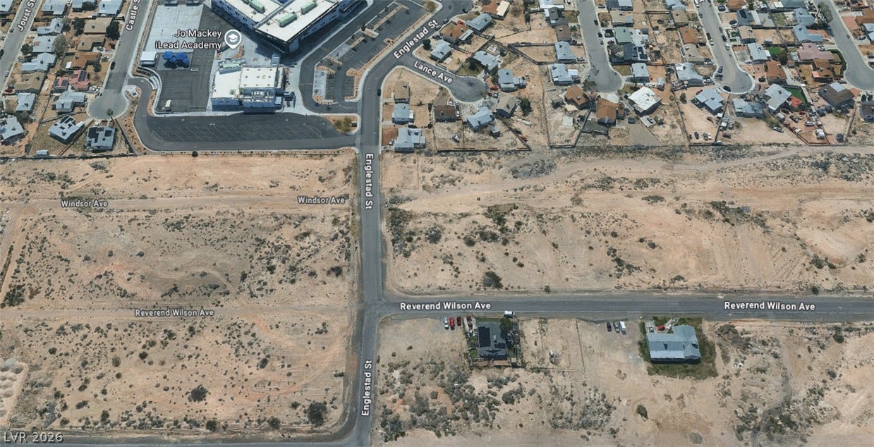 An aerial map highlights the surrounding desert landscape and nearby neighborhood streets.