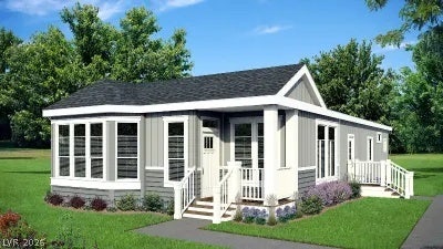 A classic covered porch and large bay windows define this charming single-level residence.