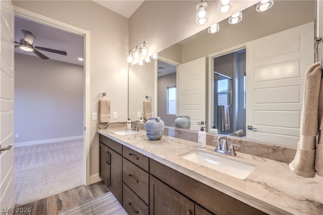 5455 Grambley Street, Las Vegas, NV 89149 Jack and Jill bathroom, dual sink and separate tub and toilet area (for 2 of the secondary bedrooms)