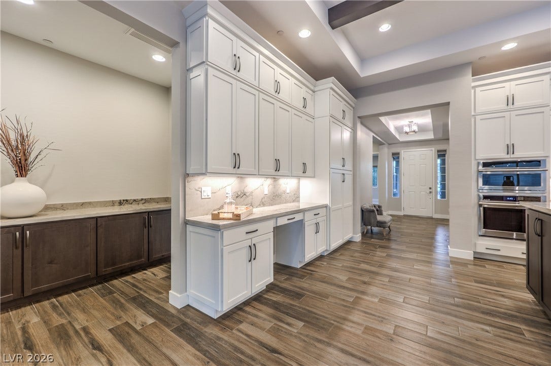 5455 Grambley Street, Las Vegas, NV 89149 Additional kitchen storage with wall pantry, desk area and more storge leading to bedrooms, 11-foot ceilings and entry
