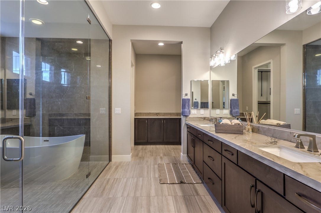 5455 Grambley Street, Las Vegas, NV 89149 Spa-like primary bath includes dual vanities and plenty of counter and storage space
