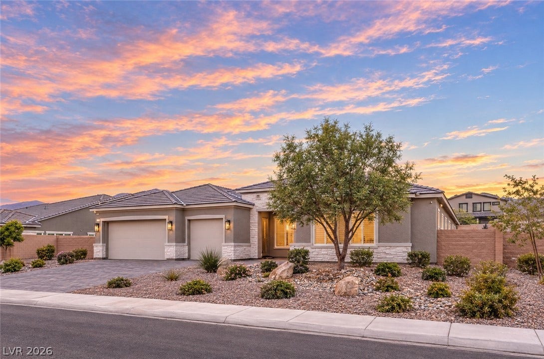 5455 Grambley Street, Las Vegas, NV 89149 Oversized 3 car garage, paved driveway and 38-foot-wide side yard for possible RV parking or pickle ball court or additional building space