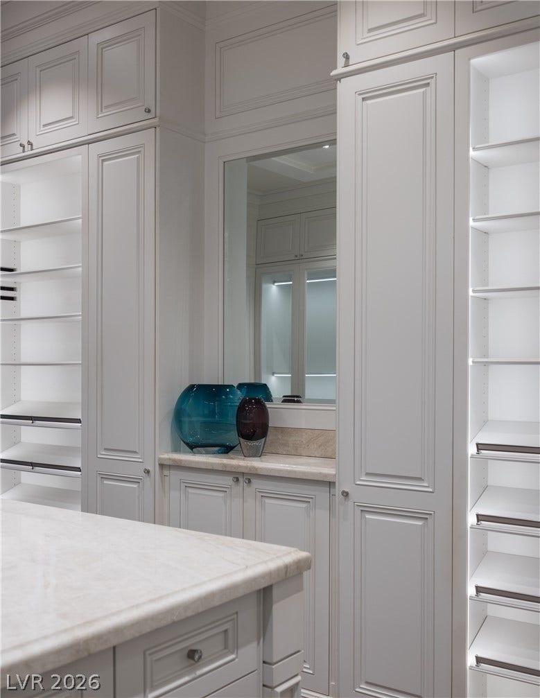 9017 Grove Crest Lane, Las Vegas, NV 89134 Primary closet 1 - "hers"
