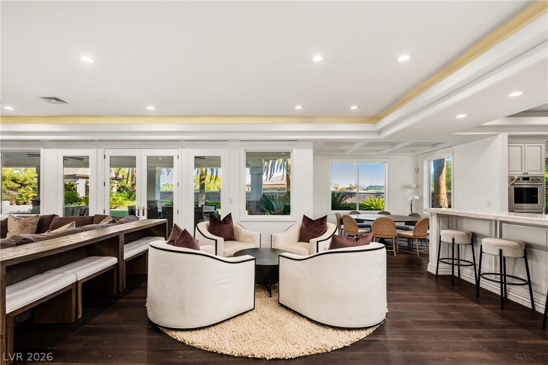 9817 Mountain Grove Court, Las Vegas, NV 89134 Gleaming hardwood floors and recessed lighting define this expansive open-concept living area.