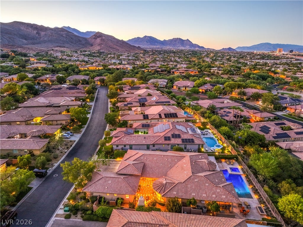24 CROSS RIDGE Street, Las Vegas, NV 89135 Dramatic mountain vistas frame this peaceful neighborhood of elegant tile-roofed residences.