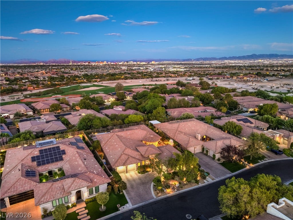 24 CROSS RIDGE Street, Las Vegas, NV 89135 Distant skyline vistas stretch beyond the tiled roofs of this suburban residential neighborhood.