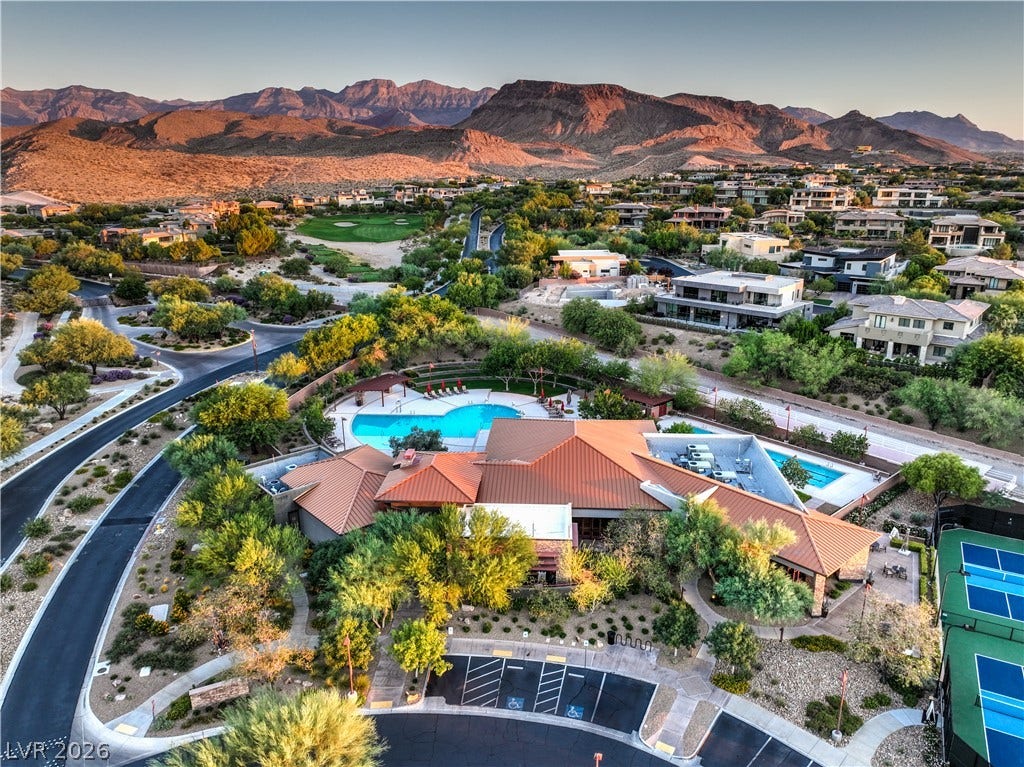 24 CROSS RIDGE Street, Las Vegas, NV 89135 Dramatic mountain backdrops frame this neighborhood containing premium shared amenities and a sprawling master-planned layout.