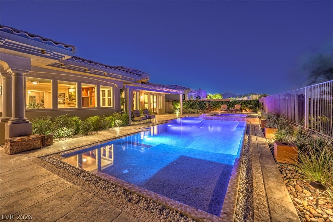 24 CROSS RIDGE Street, Las Vegas, NV 89135 A sparkling swimming pool serves as the centerpiece of this beautifully landscaped backyard oasis.