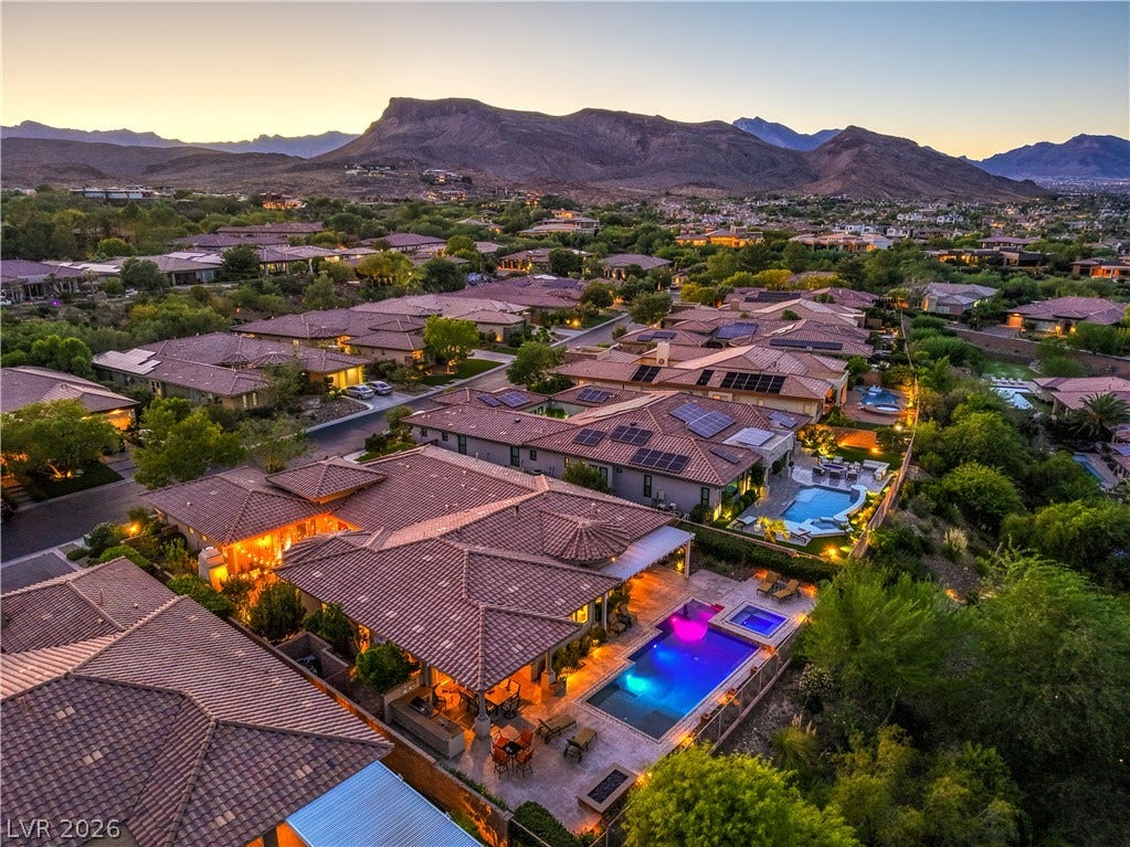 24 CROSS RIDGE Street, Las Vegas, NV 89135 Sweeping desert mountains frame this elegant community of tiled roofs and glowing backyard pools.