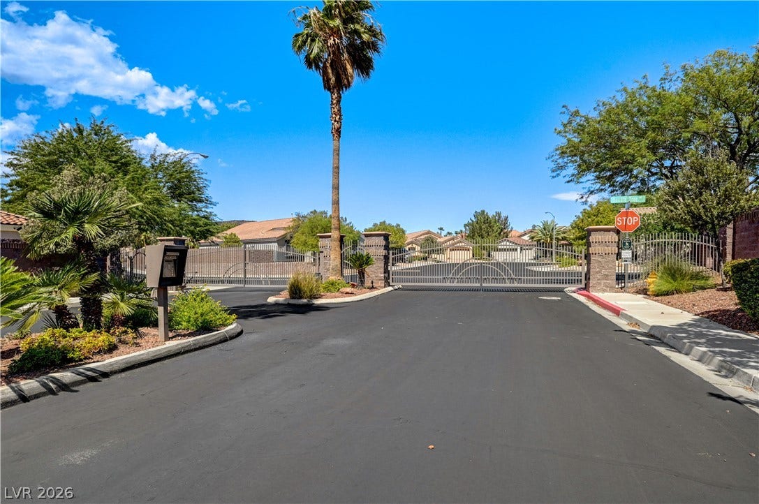 2201 Double Tree Avenue, Henderson, NV 89052 Secure gated entry welcomes residents into a beautifully maintained neighborhood community.