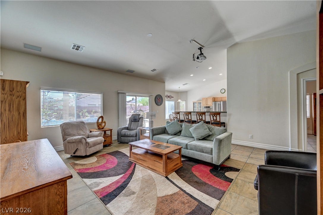 2201 Double Tree Avenue, Henderson, NV 89052 An open floorplan design seamlessly connects the main living area to the kitchen.