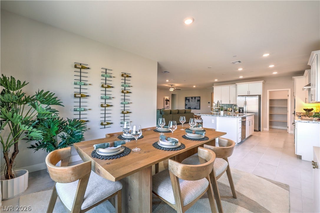 1032 Gentle Swan Street, Henderson, NV 89011 An open floorplan seamlessly connects the dining space with the kitchen.