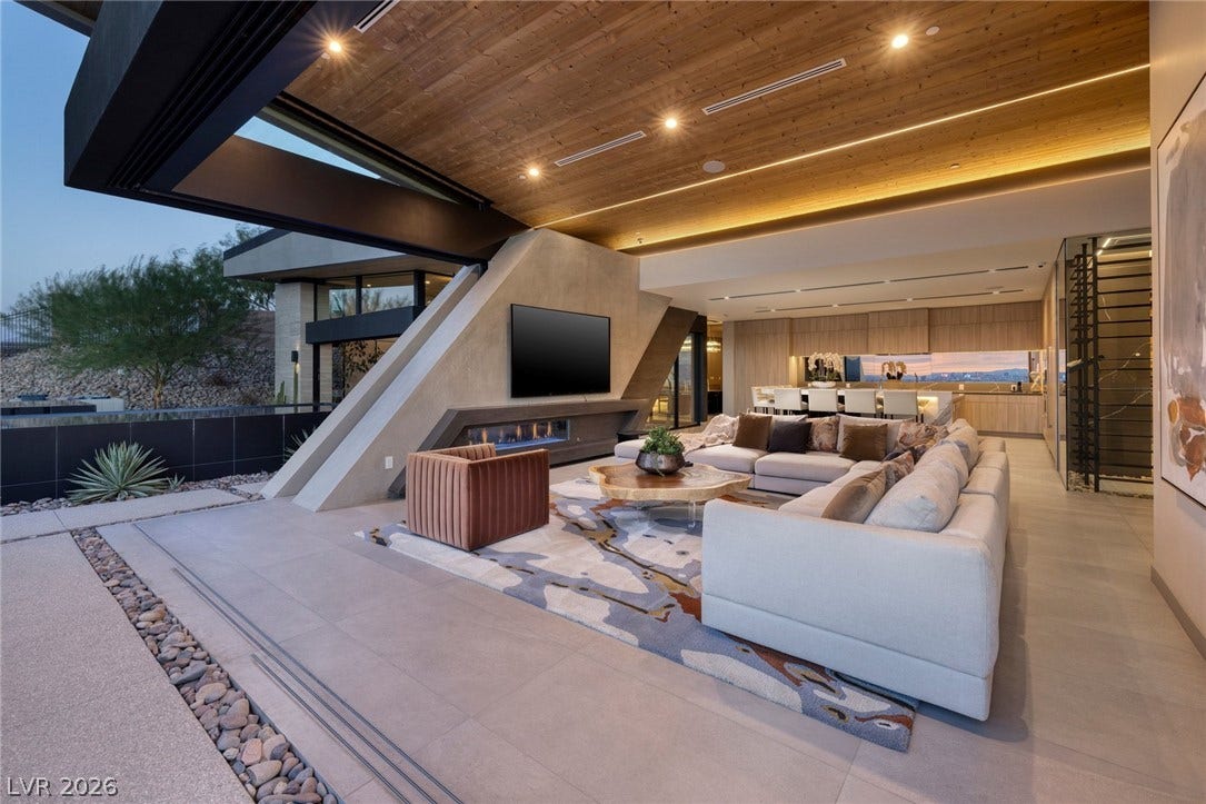 705 Dragon Peak Drive, Henderson, NV 89012 Striking architectural angles frame a seamless transition from indoor living to the outside terrace.