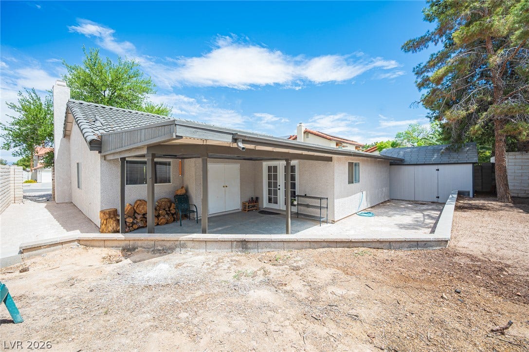 3139 Regal Oak Drive, Henderson, NV 89014 An inviting covered patio offers a shaded retreat overlooking the backyard.