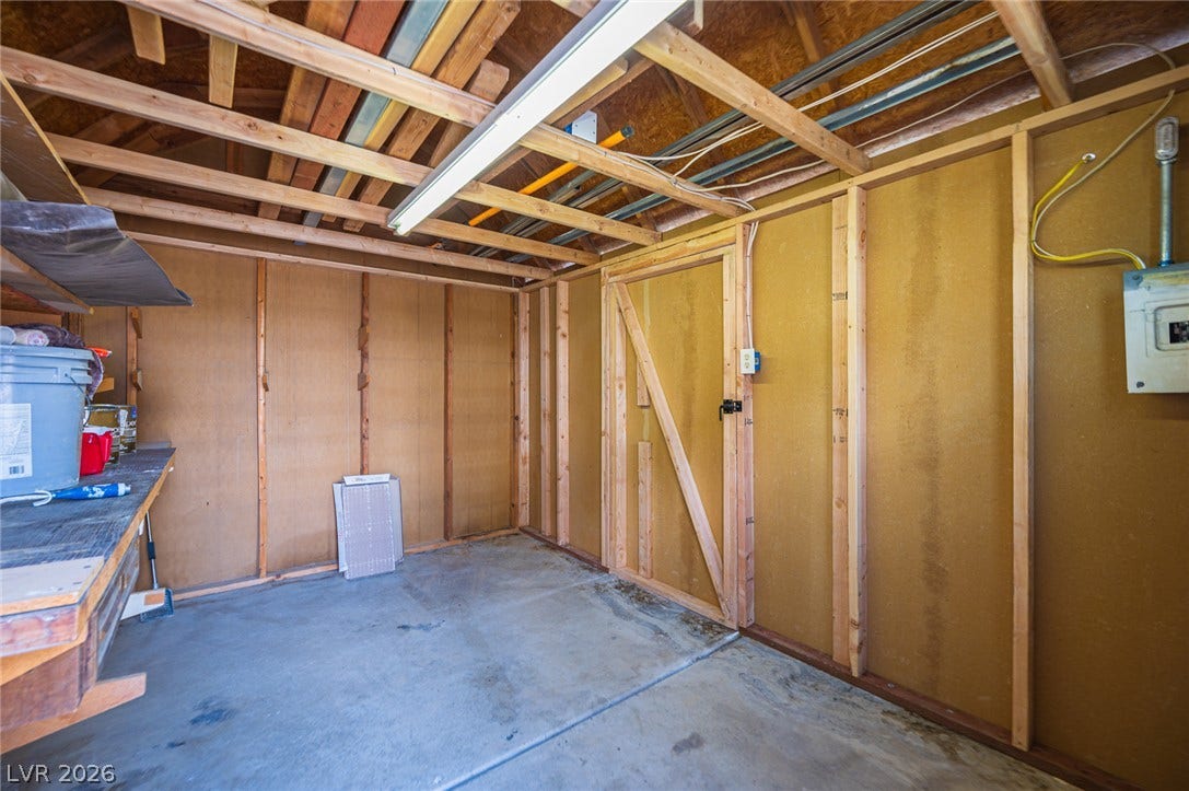 3139 Regal Oak Drive, Henderson, NV 89014 Exposed wood framing and concrete flooring define this functional storage space.