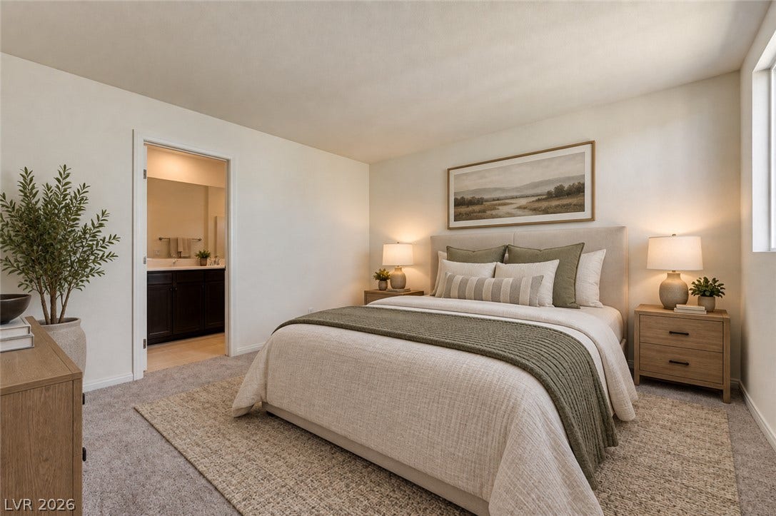 Soft carpeting underfoot defines this comfortable bedroom retreat complete with an adjoining private bathroom.
