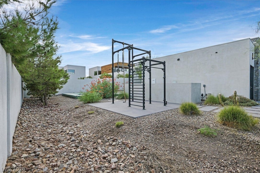 4155 Badura Avenue, Las Vegas, NV 89118 An outdoor fitness area is integrated seamlessly into the modern low-maintenance landscape design.