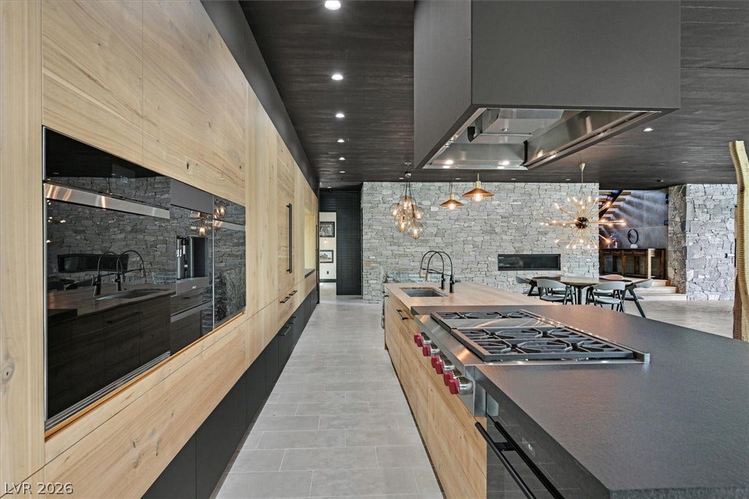 4155 Badura Avenue, Las Vegas, NV 89118 All stainless steel appliances includes two dishwashers, Wolf cooktop/grill, espresso maker, Subzero's, and wine chiller.
