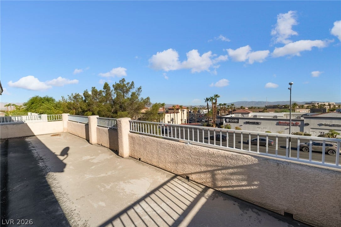 2722 Bass Lake Street, Henderson, NV 89052 A spacious rooftop terrace overlooks the surrounding neighborhood under clear blue skies.