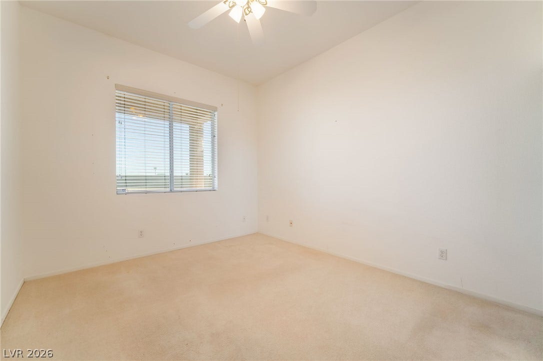 2722 Bass Lake Street, Henderson, NV 89052 High ceilings and soft neutral carpeting define this versatile secondary bedroom space.