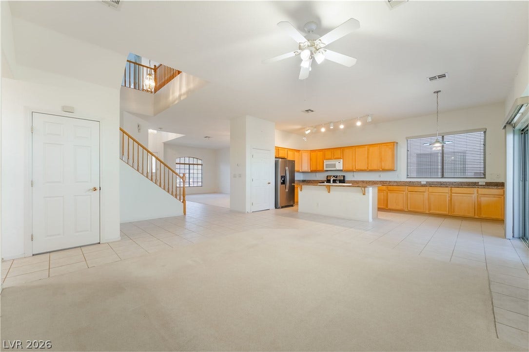 2722 Bass Lake Street, Henderson, NV 89052 An open floor plan seamlessly connects the kitchen and living areas on the main floor.