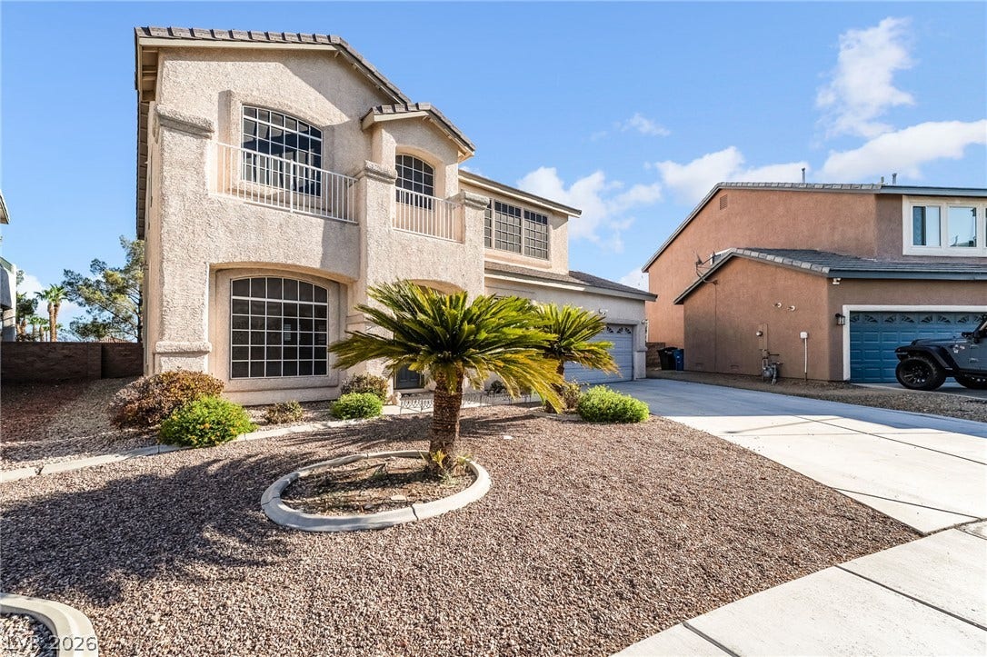2722 Bass Lake Street, Henderson, NV 89052 Arched windows and low-maintenance desert landscaping define the striking facade of this multi-level home.