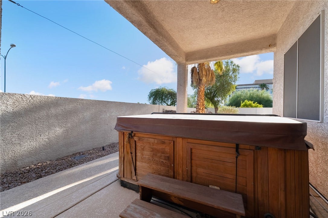 2722 Bass Lake Street, Henderson, NV 89052 A covered concrete patio provides a private setting for the outdoor spa.