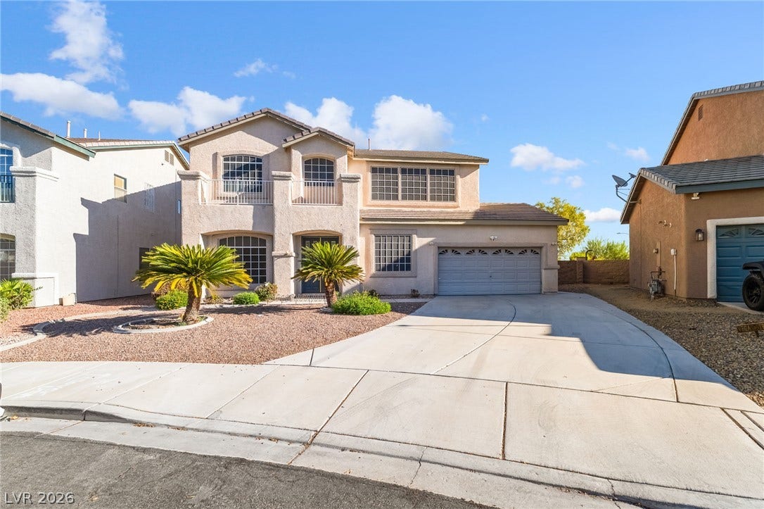 2722 Bass Lake Street, Henderson, NV 89052 Stucco cladding and a tiled roof define the exterior of this two-story desert home.
