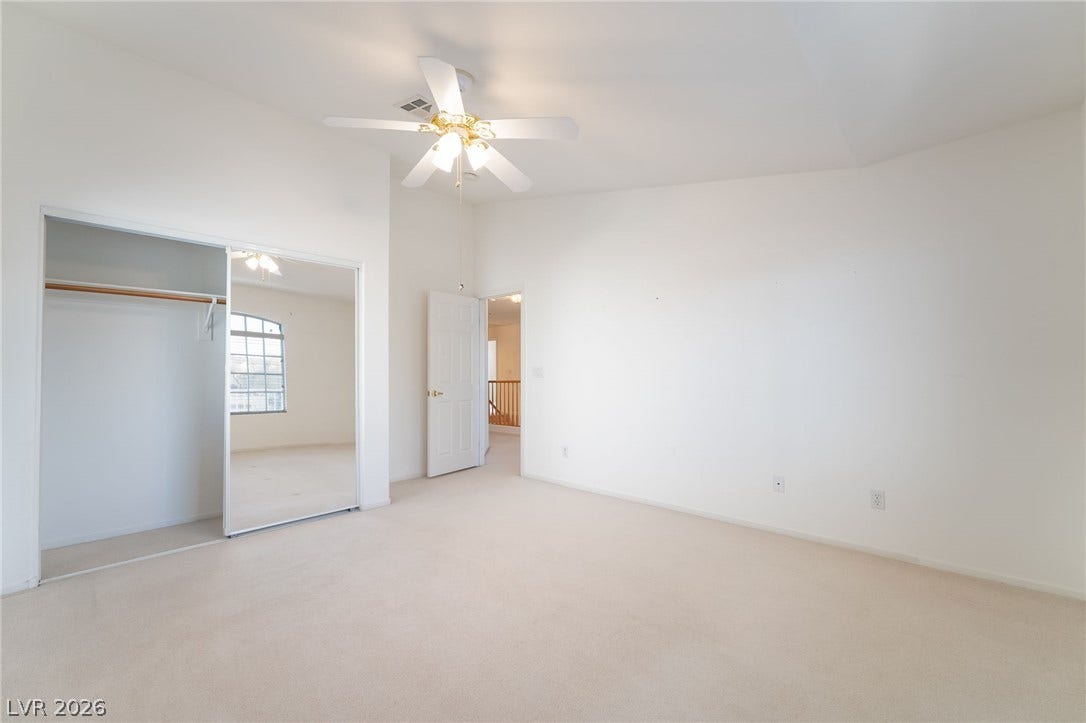 2722 Bass Lake Street, Henderson, NV 89052 High ceilings and neutral carpeting define this comfortable secondary bedroom.