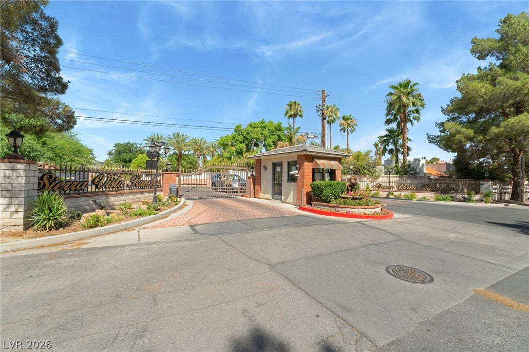 7154 Ranchito Circle, Las Vegas, NV 89120 Secure gated entry welcomes residents into this exclusive and beautifully landscaped private community.
