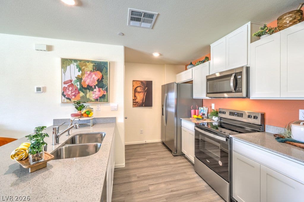 7417 Kyle Cove Drive, North Las Vegas, NV 89084 Photos are representation only, not of actual home.