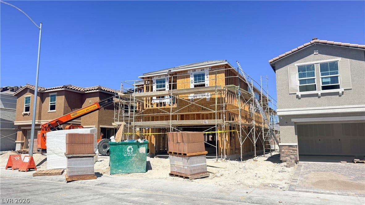4240 Mount Bonnell Avenue, North Las Vegas, NV 89081 Progress continues on this new construction home showing framing and exterior design potential.