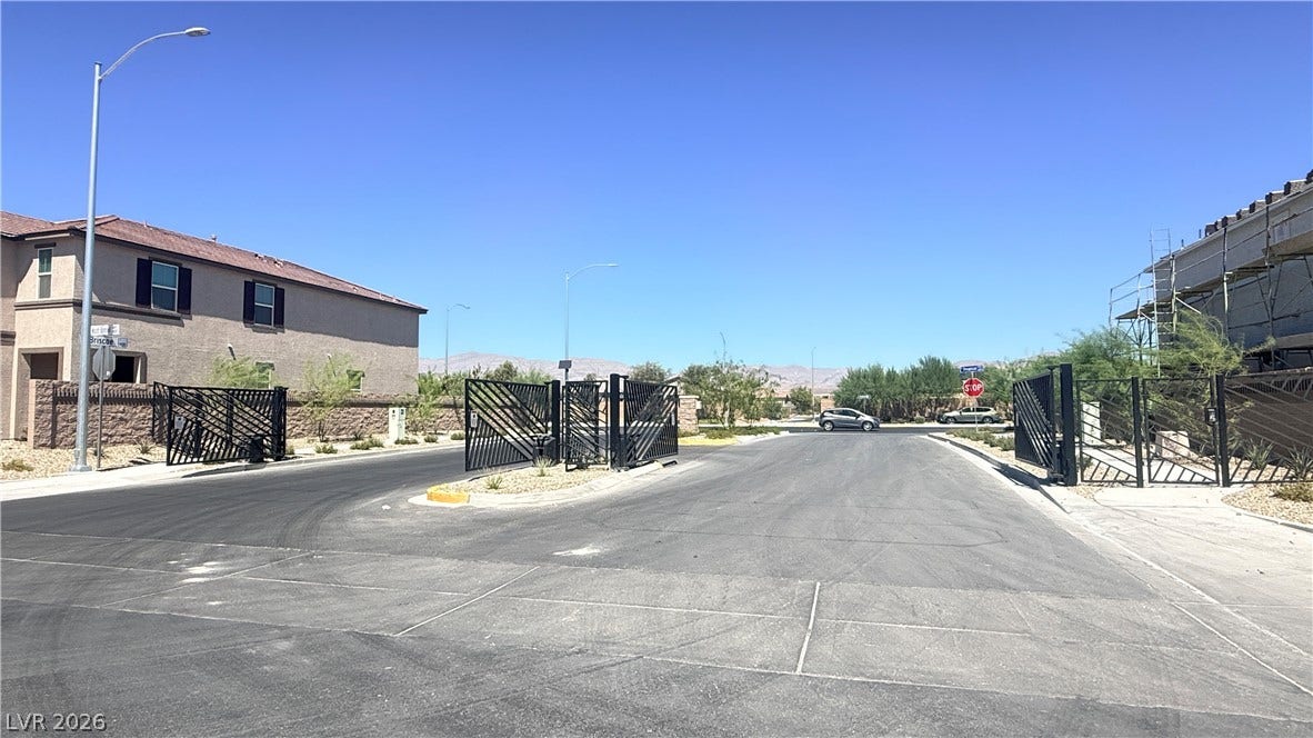 4240 Mount Bonnell Avenue, North Las Vegas, NV 89081 A secure gated entrance leads into this modern residential neighborhood.